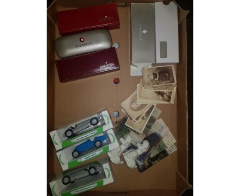 A mixed collection of items to include Sheaffer Pen Sets, Vintage Postcards, Mobil Model Racing cars etc 