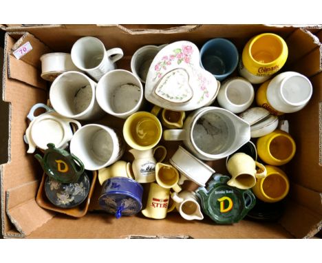 A collection of Wade advertising pots, tea bag plates etc   .These items were removed from the archives of the Wade factory a
