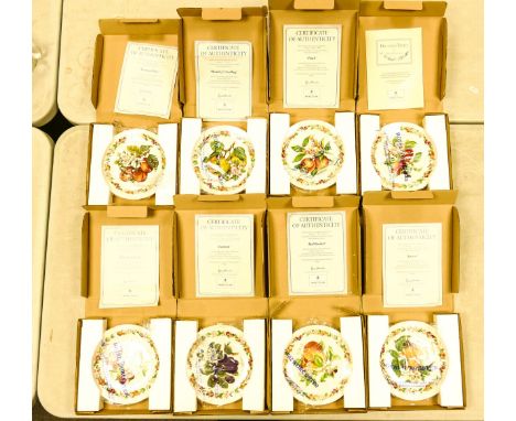 A collection of Boxed  Royal Worcester Decorative Orchard Fruits Theme Wall Plates (8) 