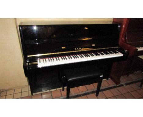 Kawai  (c2016) A Model K-15E upright piano in a bright ebonised modern style case; together with a matching stool. 