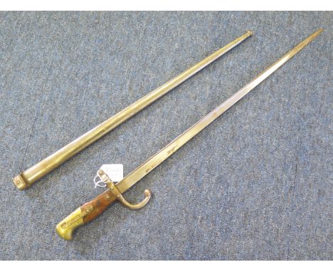 Bayonet: A French Gras Epee Model 1874 bayonet made at Chatellerault in 1878 in its steel scabbard (looks like a blockage ins