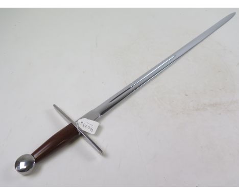 Sword: A modern Commemorative sword by The Wilkinson Sword Company & bearing their trade logo and address to the ricasso. Str