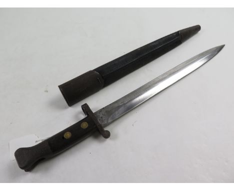 Bayonet: A Pattern 1888 MKI bayonet made at Enfield in December 1897. In its steel mounted leather scabbard. Light rusting to