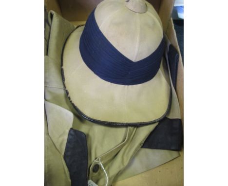 British Officers Tropical Tunic and Helmet named to a 2nd Lieut. of a Rifle Regiment. All buttons and insignia are original a