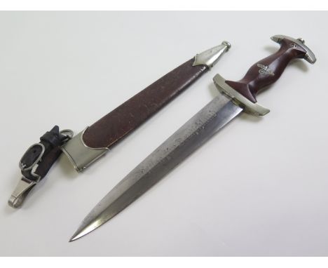 German SA Dagger with metal Scabbard, and hanger, blade maker marked 'F Plucker JR. Solingen'. Cross guard and scabbard numbe