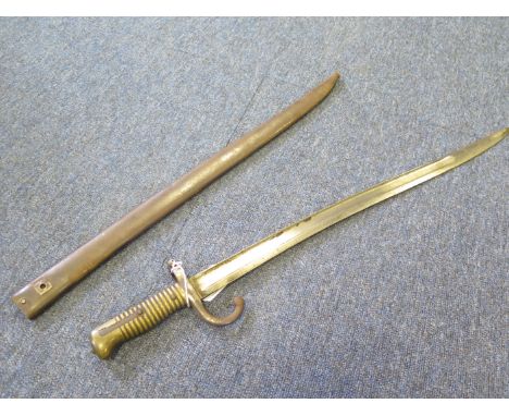 Bayonet - A Model 1866 Brass handled Yataghan bladed 'Chasspot' type bayonet. Top of blade shows manufacture at MUTZIG in May