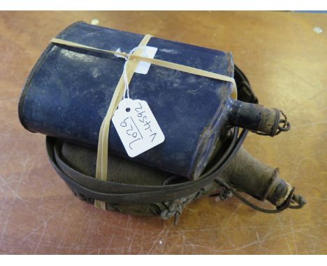 Pair of Great War water bottles. The first a French WW1 Infantry water bottle found in a French attic. Worn but complete. Kha