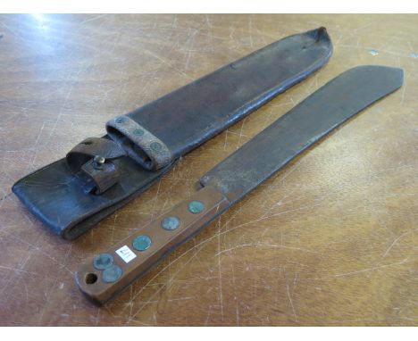 WW1 1917 dated machete complete with 1917 dated leather scabbard   