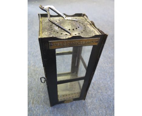 A folding trench lamp manufactured by Christopher Collins Birmingham. Brass plate states 'USE 1/2 Candles only'. Makers 1915 