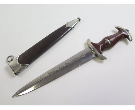 German SA Dagger with metal Scabbard, blade maker marked 'Carl Wusthof Solingen'. Small dent to scabbard, blade pitted