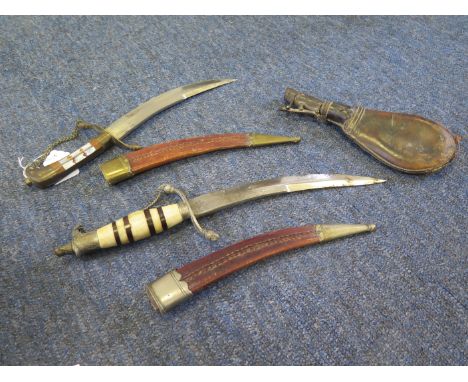 Knives: A pair of Indian tourist type knives for display in good condition and a leather shot flask (worn).