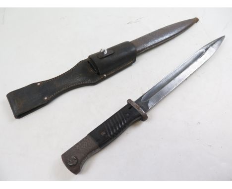 Bayonet: German 3rd Reich Model 1884/98 knife bayonet in its steel scabbard with leather frog. Ricasso marked 'J.O.S. CORRIS'