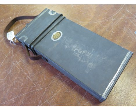 A rare tin carrying box for a folding trench lamp. Makers badge to side 'G.POLKEY LIMITED. MANUFACTURER 1915 BIRMINGHAM'. In 
