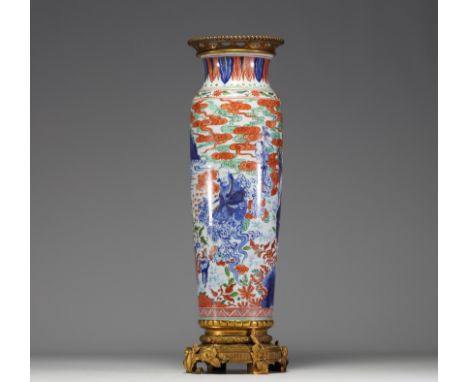 China - A polychrome porcelain vase with cloudy landscape and figures on a bronze frame, Transition period, 17th century. - W