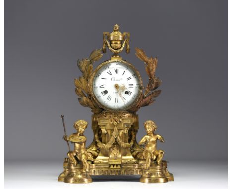 An ormolu and chased clock, allegory of the arts with Putti, dial signed Cherier in Paris, Louis XVI period. - Weight: 10.04 