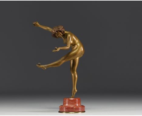 Claire Jeanne Roberte COLINET (1880-1950) "La Jongleuse" Sculpture in bronze with gold patina on red marble base, circa 1930 