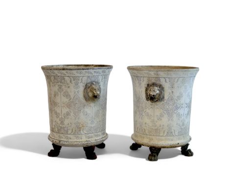 A pair of enamelled cast-iron orange tree pots from the Cristallerie emaillerie Saint-Joseph-du-Bourget, decorated with lambr
