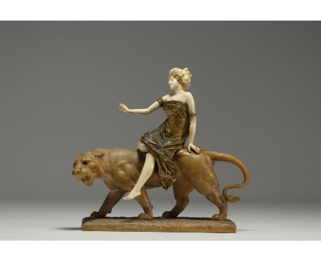 Paul PHILIPPE (1870-1930) "Woman and lioness", chryselephantine sculpture in bronze with multiple patinas and ivory, lioness 