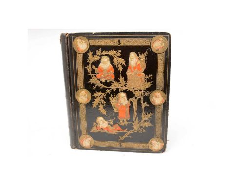 A Victorian scrapbook, circa 1880, the cover showing early depictions of Father Christmas in red, containing Lincrusta, Valen