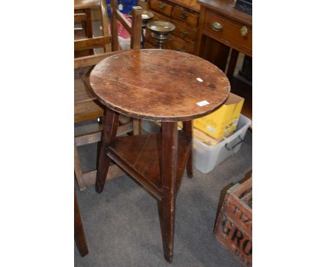 19th Century stained pine cricket table with circular top, central shelf and three tapering legs, top 50cm diameter, height 7