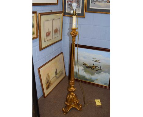 A 20th Century standard lamp, the gilt finish stem inset with mirrored panels and raised on three scroll feet, 151cm high