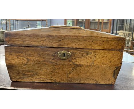 19th Century rosewood sarcophagus formed tea caddy with hinged lid opening to an interior with two compartments and a central