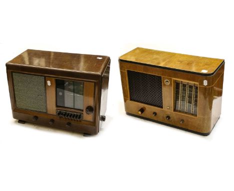 with large vertical tuning scale and push buttons; a Philco three-band set with magic eye tuning, in veneered case; an unmark