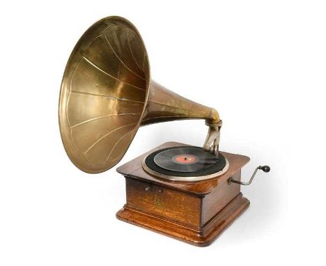 American, circa 1910, with Columbia soundbox, 12.1/2-inch turntable with raised surround, sectional brass horn (old solder re