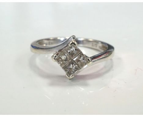 FOUR STONE PRINCESS CUT DIAMOND CLUSTER RINGon nine carat white gold shank with twist setting, the diamond totalling approxim