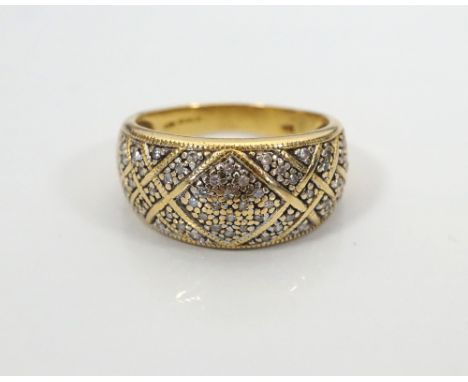 MULTI DIAMOND SET DRESS RINGin eighteen carat gold, the diamonds in attractive geometric setting, ring size P
