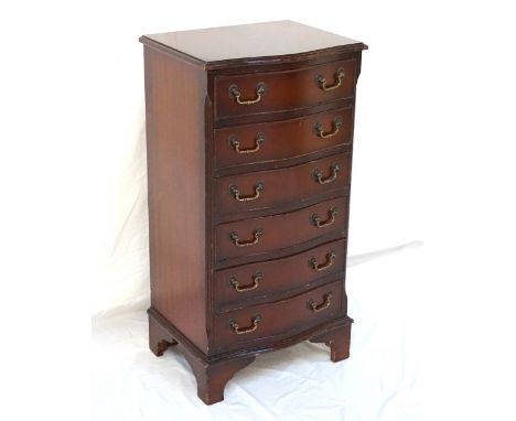 TALL MAHOGANY SERPENTINE FRONT CHESTwith six twin-handled drawers, raised on bracket feet, 96.5cm high x 50.5cm wide