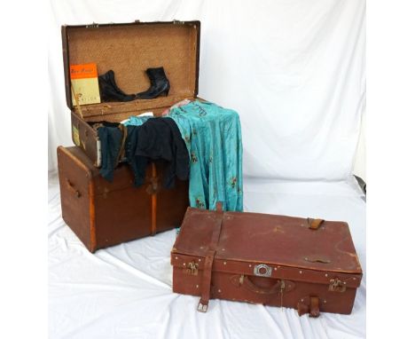 VINTAGE METAL BOUND TRAVEL TRUNKcontaining a selection of period ladies clothes including a pair of button-up leather boots, 