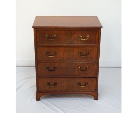 GEORGE III STYLE MAHOGANY AND CROSSBANDED CHEST OF DRAWERSof narrow proportions with four cockbeaded drawers with brass handl