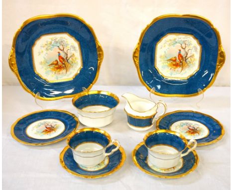 VINTAGE 'E.HUGHES & Co.' CHINA TEA SERVICE
with central colourful pheasant and blossom decoration (to the interior base of cu