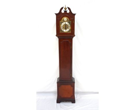 MAHOGANY CASED GRANDMOTHER CLOCKearly 20th century, the hood with swan neck pediment and central brass finial, the brass face