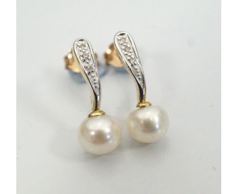 PAIR OF ATTRACTIVE DIAMOND AND PEARL DROP EARRINGSin nine carat gold