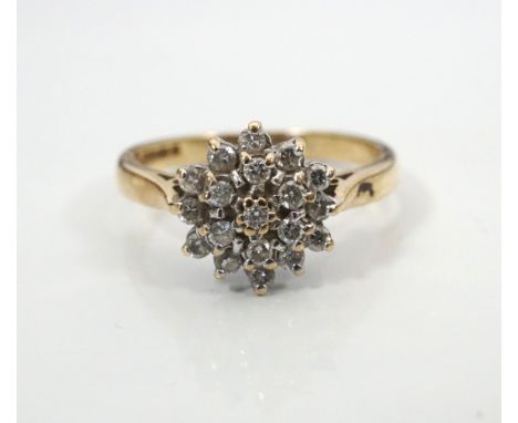 NINE CARAT GOLD CLUSTER RING
on nine carat gold shank, the diamonds totalling approximately 0.33cts, ring size K