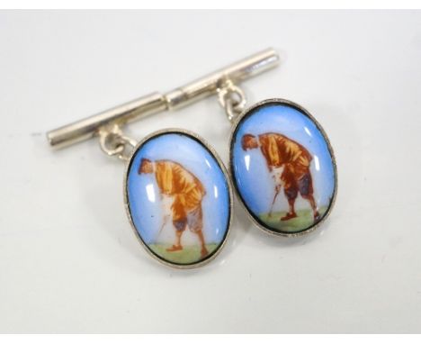 PAIR OF SILVER AND ENAMEL GOLFING CUFFLINKSthe two oval enamel panels depicting a golfer