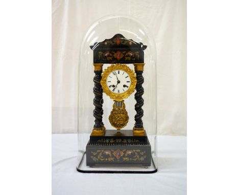 19th CENTURY FRENCH EMPIRE PORTICO MANTEL CLOCKthe ebonised frame with four gilt metal mounted barley twist columns, brass an