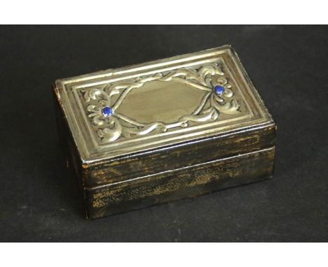 An Italian repousse silver and leather jewellery box with lapis lazuli cabochon detailing along with a silver abstract design