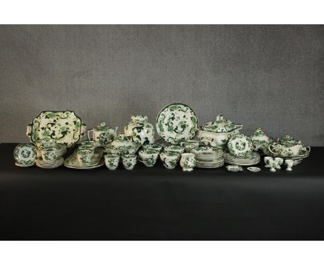 A Mason's ironstone Chartreuse pattern dinner set, comprising tureens, a jar and cover, a teapot, cups, saucers, plates, egg 