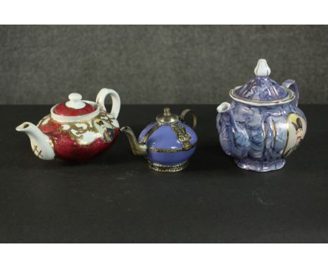 Three porcelain and pottery teapots, two made for the Persian market with portraits of Naser al-Din Shah, one by ANA Fine Chi