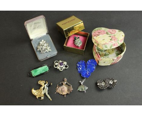 A collection of costume jewellery brooches, including a boxed Butler &amp; Wilson diamante lemon brooch, a blue enamel pansy 
