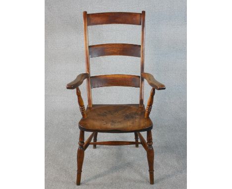 A 19th century ladder back open armchair, with a shaped elm seat on turned legs joined by H stretchers. 