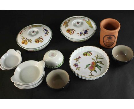 A collection of ceramic dinner ware this includes three pieces of Royal Worcester Evesham and other serving dishes and a terr