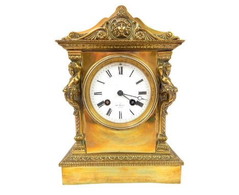 A late 19th century French gilt striking mantle clock of architectural form, the white enamel dial and movement by Henry Marc