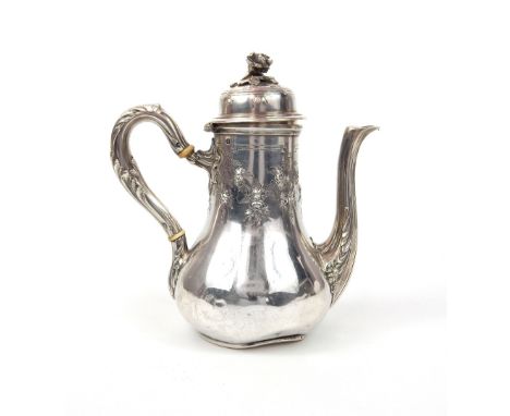 A small mid 19th century French silver coffee pot, the hinged lid, with a cast rose finial, the 'C' scroll handle and pouring