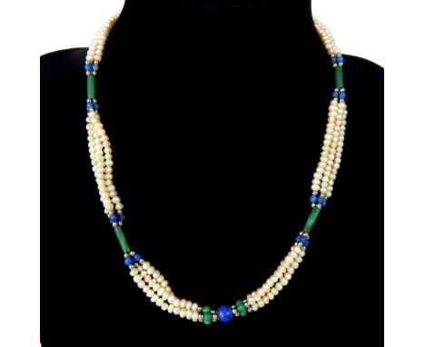 A 1920s / 1930s pearl necklace on three strings, with malachite, lapis lazuli and white metal spacers, with a white metal fil