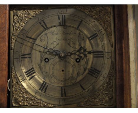 A MID 18TH CENTURY OAK CARVED LONGCASE CLOCK BY ARCHIBALD STRACHAN - NEWCASTLE, the 11" brass dial with subsidiary seconds di
