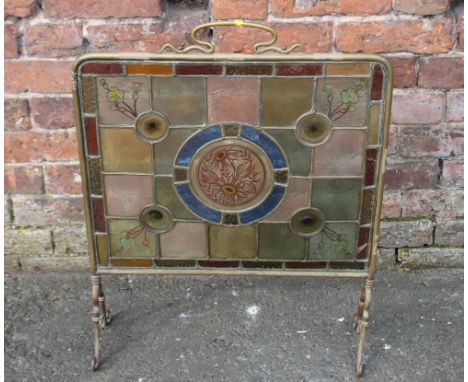 AN ARTS AND CRAFTS LEADED STAINED GLASS FIRE SCREEN, with central sunflower panel, overall H 71.8 cm, W 54 cm